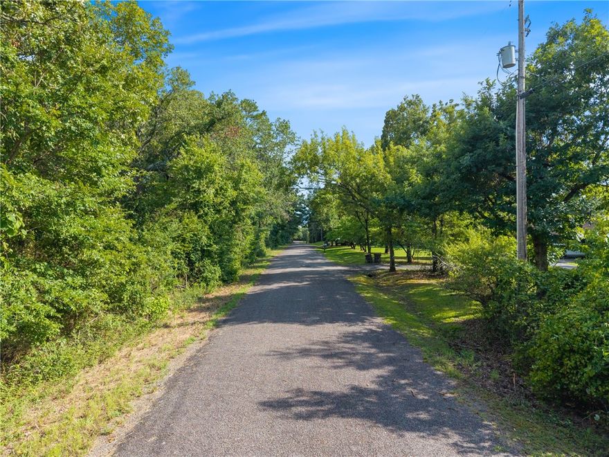 Build your dream home on this 2.53 acre wooded lot in an established and peaceful subdivision! Tucked away in a quiet, scenic area, this spacious lot offers privacy, natural beauty, and the potential for stunning mountain and river views once you clear your homesite. With convenient access to I-40 and located less than 5 miles from Arkansas Nuclear One, it's perfectly situated for both seclusion and accessibility. This property is a rare find and a beautiful blank canvas to bring your vision to life. 
Agents, see remarks for additional information.