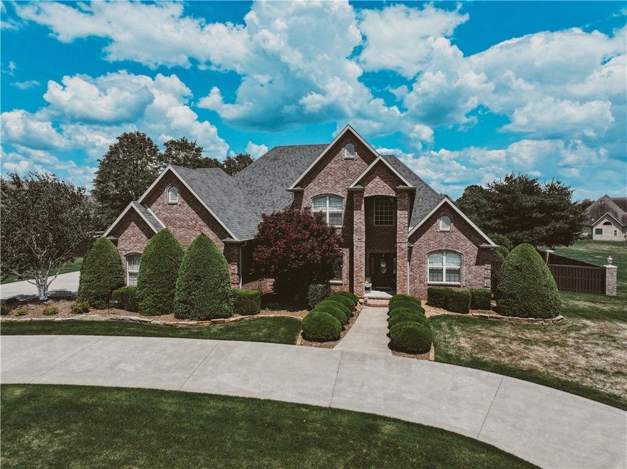 Meet Tranquility, the epitome of work life balance! This distinctive neighborhood has been a cornerstone of the community for two decades, offering a unique blend of stability and charm. Its prime location in W Bentonville renders it a truly iconic destination. As you enter the neighborhood, you are immediately immersed in a sense of warmth and belonging. The picturesque scenery, replete with manicured lawns and people at play, creates a vibrant and welcoming atmosphere. This neighborhood expertly balances seclusion and community, catering to a diverse range of preferences. The property itself boasts an array of impressive features, including 5 spacious bedrooms, 3.5 bathrooms, and a expansive 3-car garage. The sprawling 1.5-acre property, complete with beautifully landscaped grounds, further enhances the property's appeal. With its prime location, excellent schools, and abundance of outdoor recreational activities, this neighborhood is an ideal destination for peoples seeking a unique and welcoming neighborhood!