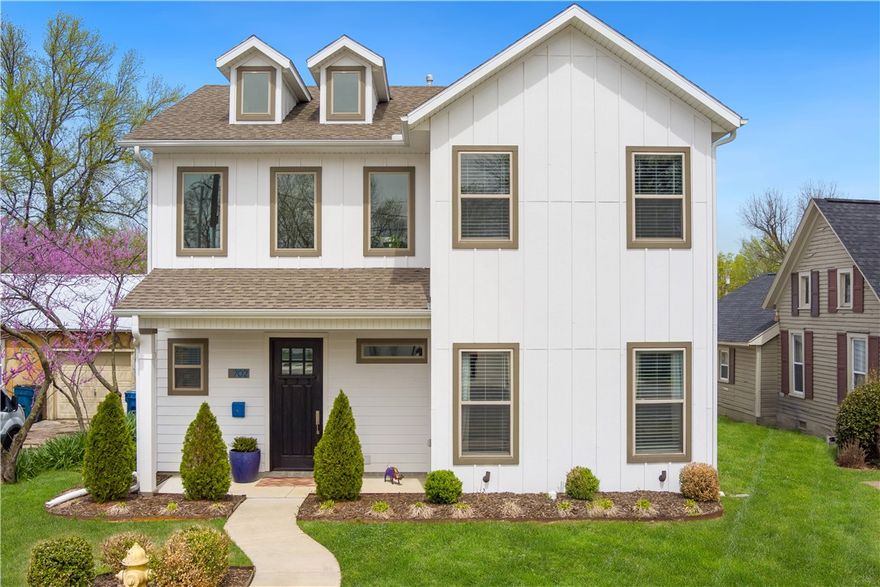 Located only 3 blocks from the Downtown Bentonville square, this stunning home is close to all entertainment, dining, and shopping that Bentonville has to offer. The cathedral ceilings will welcome you with open-concept living on the main floor. The primary suite features tall ceilings and a large frameless glass walk-in shower. Upstairs, you will discover 3 bedrooms and 2 bathrooms. One of the rooms is large enough to be a movie or game room. The garage attached to the home is currently being used as a gym area, and there is a detached garage off the home as well. Walk or bike to Coler Mountain Bike Preserve 1/2 a mile away or 1/2 a block from Bogle Public Park. This is a great home for entertaining and living a Downtown Bentonville lifestyle!