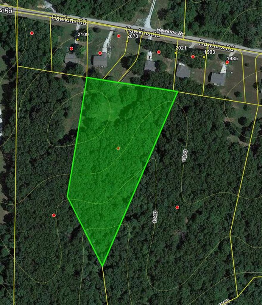 Looking for a Wooded Building Site, with City Water & Electric available? Great Building site 3.93 acres, Single frame-built home with total interior finished floor area of not less than 1200 sq ft, excluding garages. No manufactured or mobile homes shall be permitted. 5 minutes to WalMart, 30 minutes to Branson MO, 30 minutes to the Buffalo River,  Buyer to verify all utilities.