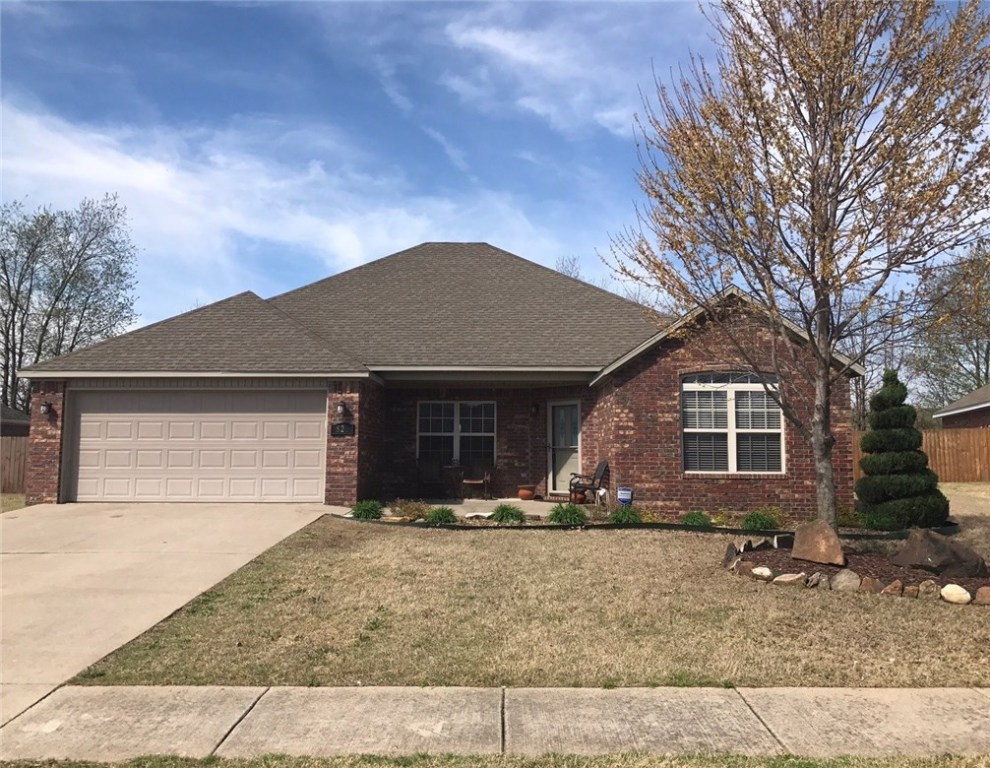 Well maintained, all brick home with in-ground pool.