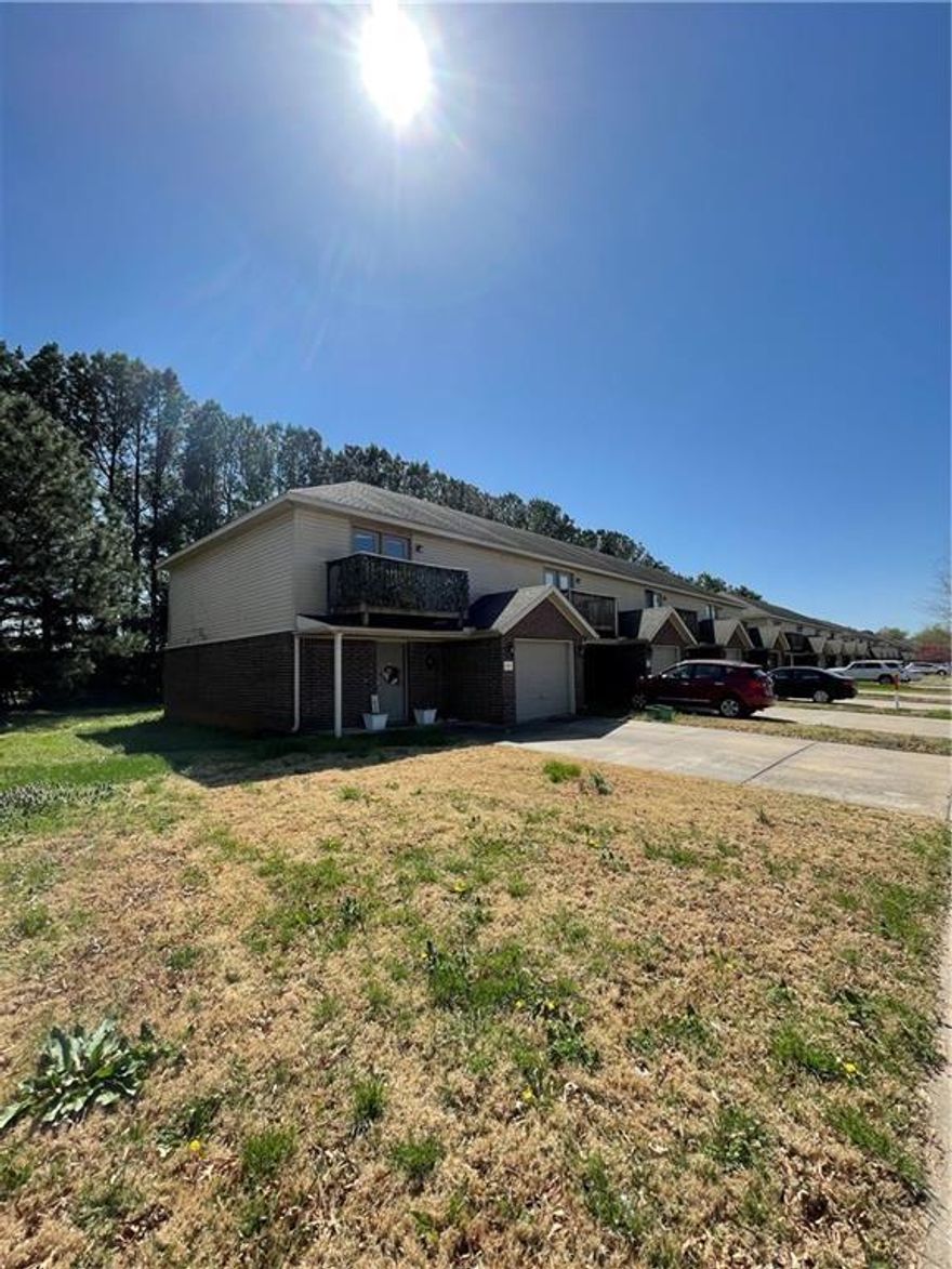 Great townhouse/condo with lots of extras. Spacious living room & kitchen with dining area. Upstairs there are 2 bedrooms & 2 baths with a half bath downstairs. 1 car garage. Conveniently located & close to U of A.