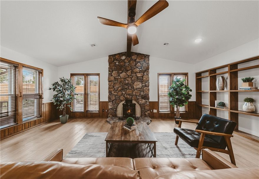 This beautifully remodeled home sits on a spacious corner lot in a quiet cul-de-sac just off New Hope—minutes from I-49, the Promenade, AMP, & only a 5-minute walk to Dock Wheeler Park & Rogers Aquatic Park. Thoughtfully redesigned by Stone Harbor Custom Homes, every detail has been updated w/ care & fully permitted through City of Rogers. This home blends modern updates w/ timeless charm. Inside, enjoy luxury vinyl plank flooring throughout, fresh interior paint, dramatic floor-to-ceiling native rock gas fireplace that anchors the living room w/ warmth & character. The kitchen has been beautifully updated w/ new stainless steel appliances, granite, backsplash, bar area, modern lighting & hardware. Bathrooms have new sinks, toilets, fixtures, tile, & hardware, creating spa-like retreats. Additional new updates included: roof, HVAC unit, light fixtures, insulation,& fresh exterior paint. Outside, you’ll love the curb appeal w/ fresh landscaping & flower beds galore, 6x8 storage building, & a 2 car side load garage