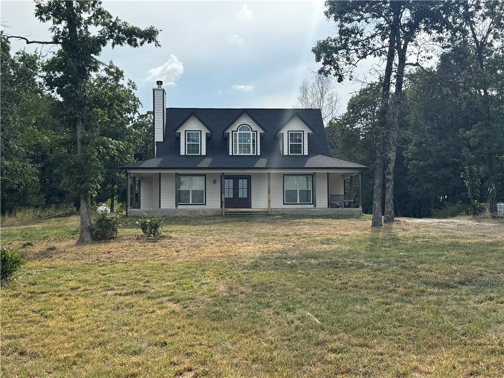 Welcome to your dream retreat in the heart of the Ozarks! This beautiful two story home sits on 20 acres with great views of sesonal fall colors all from your covered front porch. Discover a rare slice of outdoor paradise located in northeast Madison County, Arkansas, near Ponca and the Buffalo River. The two story home is turn key ready for full time living or as a vactional retreat offering an abundance of wildlife and minutes drive to the Boxley Valley and the resident elk herds.