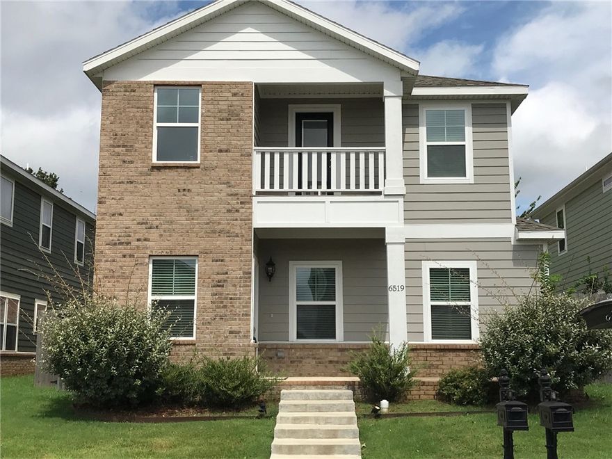 Beautifully designed two-story single-family home offering 3 bedrooms, 2.1 baths, and 1,907 sq ft of thoughtfully planned living space. The open-concept first floor features wood flooring, a cozy living area with fireplace, and a stylish kitchen with granite countertops—perfect for everyday living and entertaining. All bedrooms are located upstairs, including a spacious primary suite with a charming nook ideal for reading, a desk, or quiet retreat. One secondary bedroom features its own private balcony, adding a unique and inviting touch. Each side of the home offers a private, fenced yard area, with one side covered for added outdoor enjoyment. Ideally situated near Promenade Mall, Walmart AMP, Topgolf, popular restaurants, and nearby trails, offering both comfort and convenience.