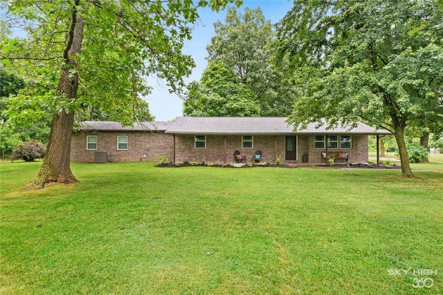Open house canceled due to pending contract. Peaceful setting and tons of space! Need space to park an RV? You found it! Want a place to relax at the end of a long day? You found it! And only 10 minutes from town. This home has been remodeled from top to bottom with high end finishes. Everything in this home is new - even the drywall. Custom cabinets with huge island. Over-sized dining area and open to the family room make this home perfect for entertaining your guests. Single car garage is over-sized at 20x21 and could be converted to a two car garage. Don't let this one slip away!