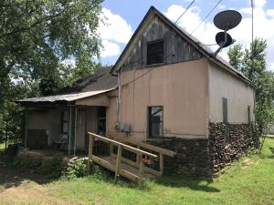 2 bed 1 bath home in downtown coal hill. Close to everything and close to Arkansas river. Would be great project home.
