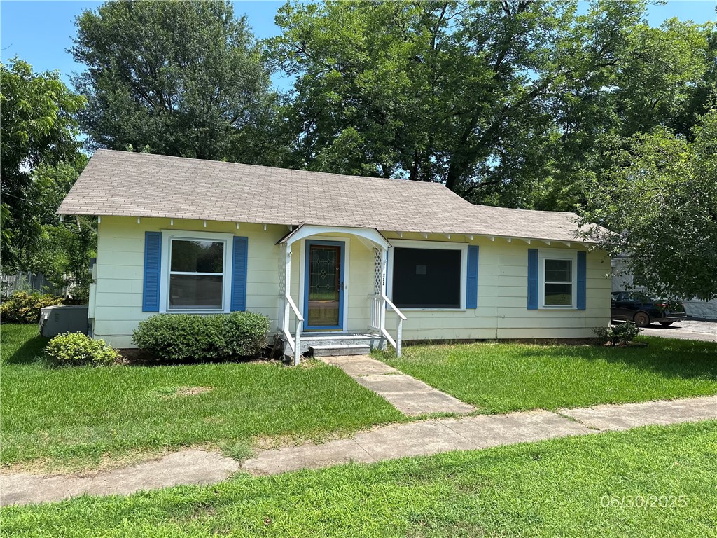 There is so much to love about this super cute historic home conveniently located close to Arkansas Tech University. This 3 bedroom and 2 full bath home features a large living room plus a cozy den (or it could easily be a 4th bedroom), dining room plus a separate breakfast area. The shade from the mature hardwood trees will allow you to enjoy the spacious back yard and patio area. year round. The original hardwood floors have beautifully been refinished. There is a detached garage and plenty of outside parking. This is a foreclosure and seller will not pay customary title police, escrow fees, survey or transfer fees. POF or Pre-Qual letter dated 30 days or less required with offer. All offers must be submitted at www.vrmproperties.com. Agents must register as a user, enter the property address, and click on start offer.