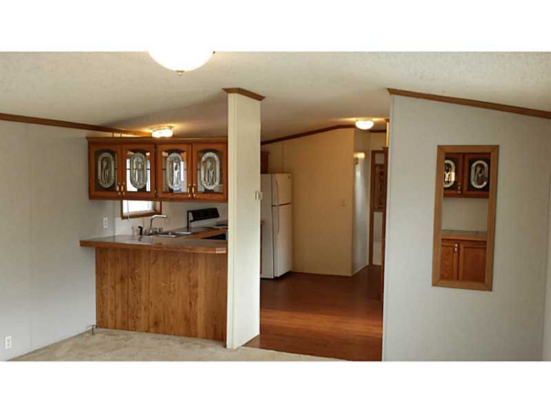 Completely renovated modular on permanent foundation. Lots of space, The kitchen has lots of space and the bedrooms too!.New flooring, fixtures, windows, appliances, paint