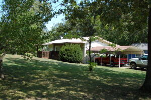 Located in the peaceful lake community of Diamond City this 1bed 1bath mobile would be a great Bull Shoals lake retreat! You will enjoy the relaxing covered deck, metal roof, sunroom add on, new metal storage building, concrete parking for your boat, carport and more! Just around 2 miles from boat launch and public use area. Home is part of an estate and is being sold ''As Is''.