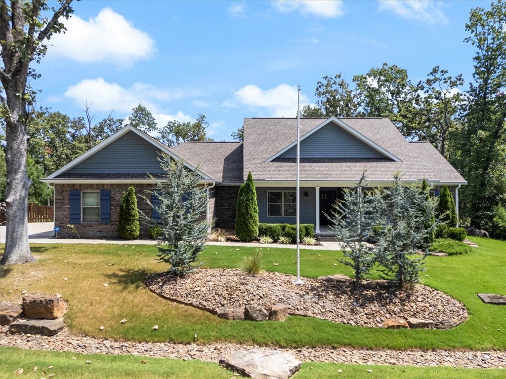 3 Carrick Circle is Absolutely Fabulous! First ask yourself these questions to see if it's right for you. 1. When you arrive home, do you drive straight into your garage and shut the door to avoid your neighbors? 2. Would you like two extra lots to build another home or toy garage? 3. Would you like to be one of two homes on your street? 4. Do you value privacy so much that you've considered BBQing in the Buff? 1 Yes, put it on your list. 2 Yes', drive out and take a look. 3 Yes's, Come to the Open House. 4 Yes's what are you waiting for, grab it before it's gone! Truly one of Bella Vista's finest, it really is elegantly appointed with lovely cabinetry, granite and finishes. Nice flat backyard, landscaped, fenced and a wood fire pit, two blue spruces frame the front of the house. Extra lots to build a family compound or one other home or workshop. One of two homes on street so privacy is Paramount. Close to Loch Lomond, Highlands Golf, and Branchwood. Number 5, come see what the fuss is all about!