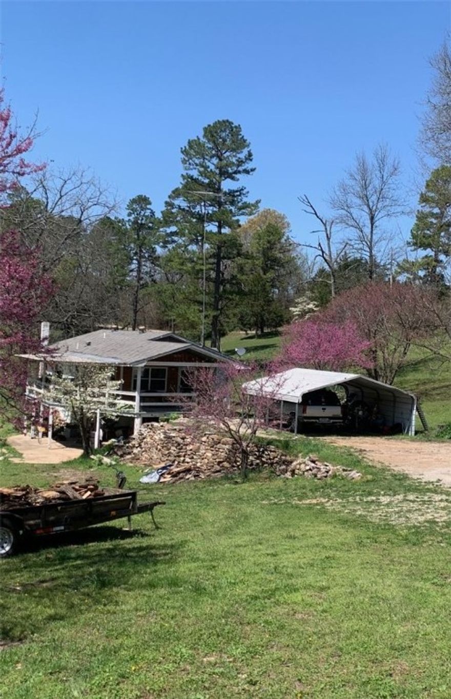Charming 3 bed, 2 bath country home with full basement on a beautiful setting near the Buffalo National River, White River, and Bull Shoals Lake. Enjoy a large, covered deck perfect for relaxing or entertaining. Property features cross-fenced pasture and a spacious 2-compartment barn with concrete floor and electricity—ideal for a shop, storage, or chicken coop. Plenty of room for livestock, hobbies, or outdoor living. Great location with endless recreational opportunities close by.