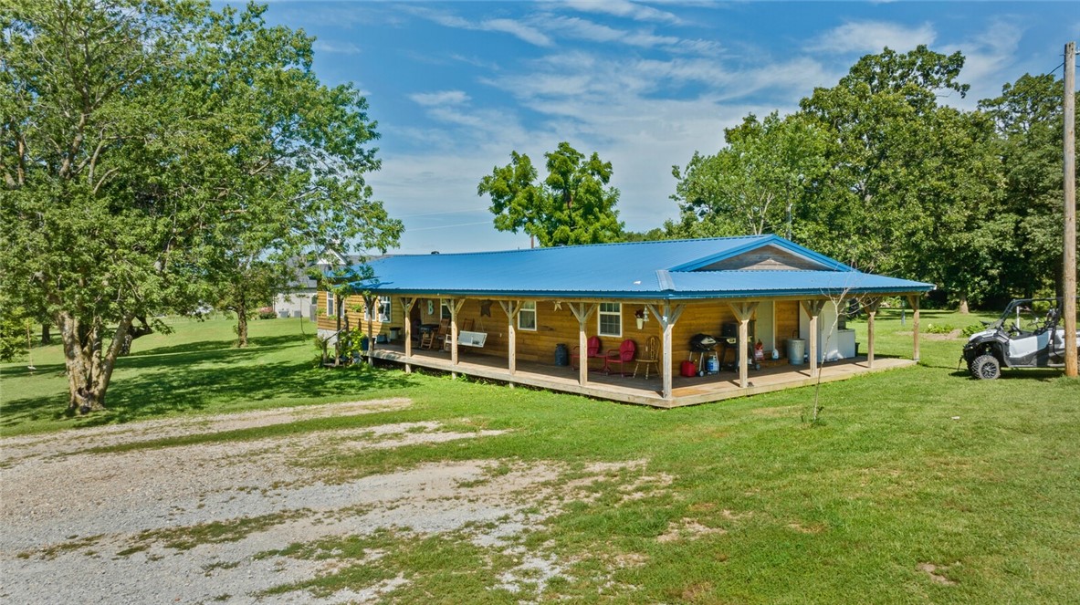 ATTENTION INVESTORS AND DEVELOPERS!!! This income producing deal is for you!!! Wonderful multiple home package with opportunity to develop! 3 homes with outbuildings. 40x50 shop & 24x30 barn with a 12x30 lean to on each side included with property! Family tenants at this time but could produce $3,600 per month potentially. Current utilities present include Carroll Electric and Centerton water, currently annexed into Centerton developments are starting soon on adjoining properties. This property is expected to have sewer soon, buyer to satisfy themselves on utilities! No deed restrictions! Don't wait, there are homes on the property, minimal value or consideration being provided to residents. However, they are in great condition and being lived in. Could also potentially be perfect for a mini hobby farm. The opportunities are endless! Animals live here- please do not enter without an appointment- seller must make arrangements. Appointment Only!! Photos on request! More photos coming soon.