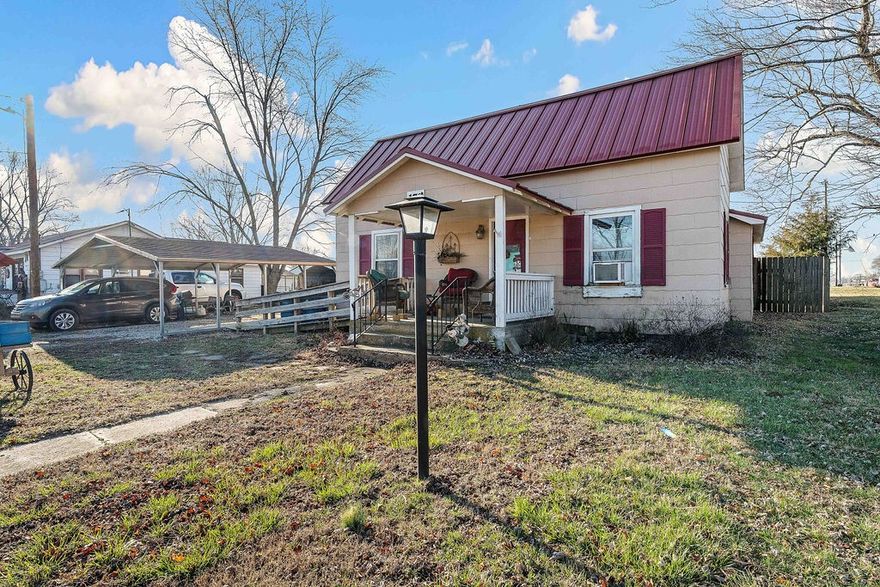 Great investment opportunity right in the heart of Pea Ridge. Property is zoned commercial.  Located on a corner lot within walking distance of schools, shopping, and restaurants. Great opportunity for a rental property, small business, or home in prime location.