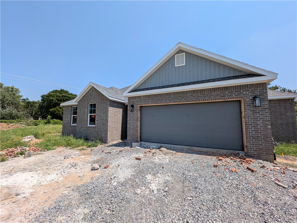 Welcome to this beautifully crafted new construction home in the heart of Gentry, Arkansas! Featuring durable tile flooring throughoutāperfect for kids and petsāthis home offers both style and functionality. The spacious kitchen is a standout, with quartz countertops, a large island, stainless steel appliances, and custom cabinetry. A split floor plan provides added privacy, while the ceramic tile shower adds a touch of luxury. Outside, enjoy a versatile space ideal for family gatherings and weekend barbecues. Conveniently located near Gentry High School, shopping, and local favorites like the Wooden Spoon, this home combines comfort, quality, and a prime location.