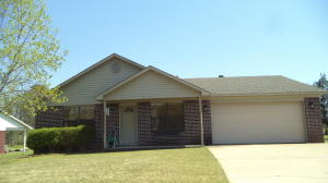 Home backs up to # 12 tee box at galla golf course! Home features 3 bedrooms 2 baths open floor plan stainless appl, with wood burning fireplace and cover back patio.