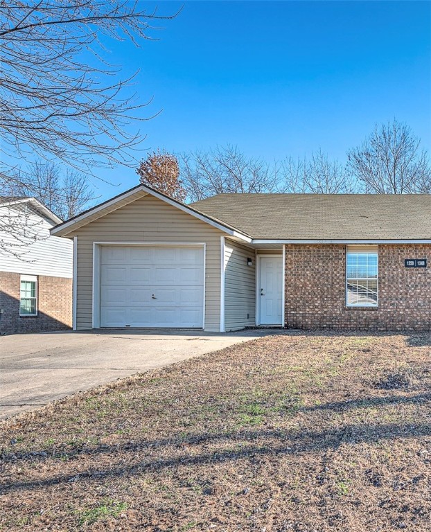 Excellent starter home or investment property in West Fayetteville! Freshly remodeled townhome (3 bedroom, 2 bathroom, 1 car garage) with new flooring, paint, counter tops, refinished cabinets, new patio door and new lighting & plumbing fixtures throughout. Brand new kitchen appliances including Refrigerator! Washer/dryer hookups. Conveniently located less than 2 miles from I-49 and only 3.5 miles to the UofA. Close to bus routes, schools, shopping, restaurants, and all amenities Fayetteville. Come see this property today! Listing is for the single townhome unit on the left side. The unit on the right side (1348 N Boxley Ave) is also for sale separately, see ML#1301684