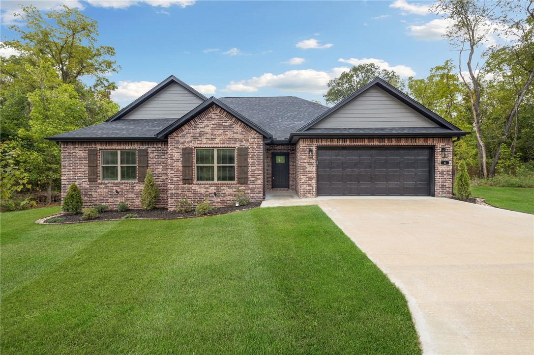 Check out this new construction home with OFFICE that was just completed and ready for you to move in! You will love the layout of this home and it is a must see. The level lot has a very nice large and level backyard and professional landscaping. Solid custom rift sawn oak cabinetry, a gorgeous tiled shower with 2 heads and glass shower door, a large laundry room are just a few of the things you will love while living here! The covered back patio has is great for entertaining and enjoying the large level backyard. The open concept layout in the kitchen and living is complimented by gorgeous 3cm quartz countertops, custom cabinets with under cab lighting and upgraded appliances. No corners were cut in building this full brick home. Call your favorite realtor to schedule your tour today!