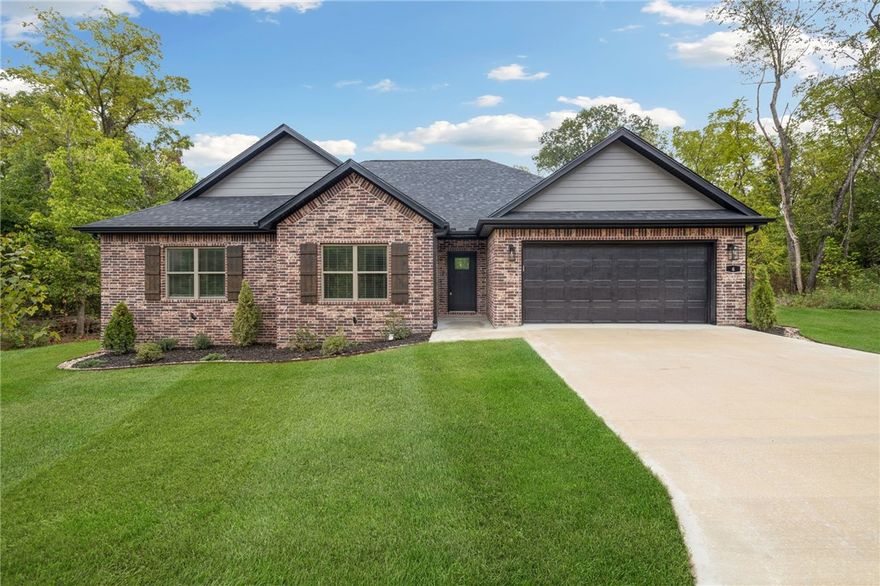 Check out this new construction home with OFFICE that was just completed and ready for you to move in! You will love the layout of this home and it is a must see. The level lot has a very nice large and level backyard and professional landscaping. Solid custom rift sawn oak cabinetry, a gorgeous tiled shower with 2 heads and glass shower door, a large laundry room are just a few of the things you will love while living here! The covered back patio has is great for entertaining and enjoying the large level backyard. The open concept layout in the kitchen and living is complimented by gorgeous 3cm quartz countertops, custom cabinets with under cab lighting and upgraded appliances.  No corners were cut in building this full brick home. Call your favorite realtor to schedule your tour today!