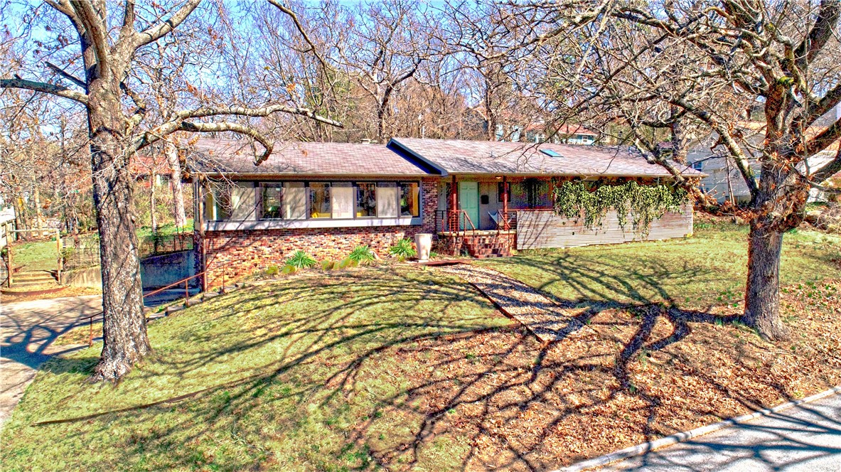 What a rare find in the Wilson Park area! This beautiful mid-century modern home was custom built in 1965, has only had two-owners & is eagerly awaiting the new owners! It has been meticulously maintained & updated so is move-in ready. Home features an expanse of windows facing the park & a beautiful wooden display area just ready to exhibit some art pieces or plants. Custom wood open cabinetry separates the living, dining & den areas. Cozy, well-appointed kitchen with gas range. Three bedrooms & two baths. Owners suite is spacious, w/updated bathroom & closet with built-in’s. Wood floors with tile in bathrooms. Two-car garage with storage rooms. Great deck overlooking tree-shaded backyard with a bioswale. Extra lot at the back of the property can be split off with buyer having right of first refusal. Don’t miss this opportunity to own a piece of Wilson Park history!