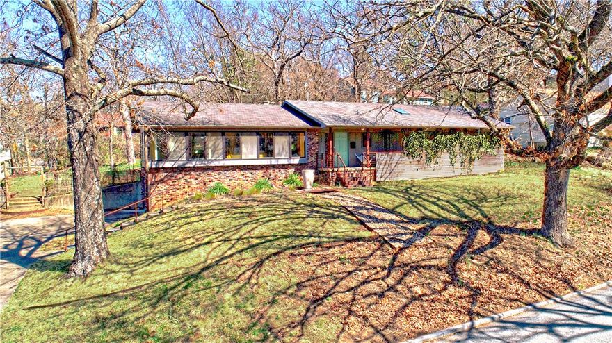 What a rare find in the Wilson Park area! This beautiful mid-century modern home was custom built in 1965, has only had two-owners & is eagerly awaiting the new owners!  It has been meticulously maintained & updated so is move-in ready.  Home features an expanse of windows facing the park & a beautiful wooden display area just ready to exhibit some art pieces or plants. Custom wood open cabinetry separates the living, dining & den areas.  Cozy, well-appointed kitchen with gas range.  Three bedrooms & two baths.  Owners suite is spacious, w/updated bathroom & closet with built-in’s.  Wood floors with tile in bathrooms.  Two-car garage with storage rooms.  Great deck overlooking tree-shaded backyard with a bioswale.  Extra lot at the back of the property can be split off with buyer having right of first refusal.  Don’t miss this opportunity to own a piece of Wilson Park history!