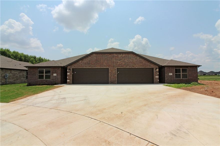 Well-kept all brick 3-bedroom 2-bath townhome centrally located and quick access to Bentonville. Wood look tile throughout main living areas with carpeted bedrooms. Granite countertops, gas cooktop, all appliances, island bar, pantry, and 2 car garage. Occupied. 24 hr. notice for showings