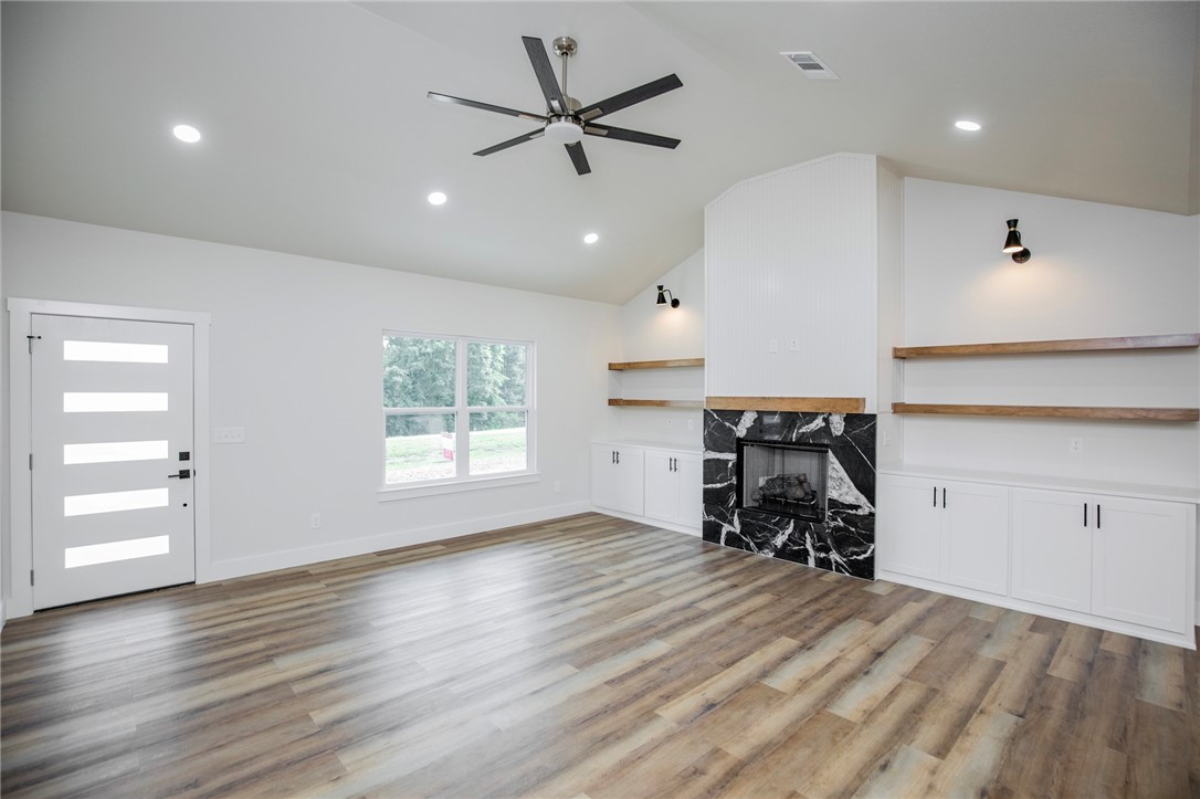 Ready to live the LAKE LIFE?!!!? Charming NEW Construction that is only a few minutes from Beaver Lake at Prairie Creek & around 10 minutes to Downtown Rogers. 3 bedroom, 2 bath, with a 2 car garage. Enjoy the peace & quiet on your covered front porch or back patio. There is also a spot cleared that the new owner could put a 30x30 shop on. This home is a must see!!!