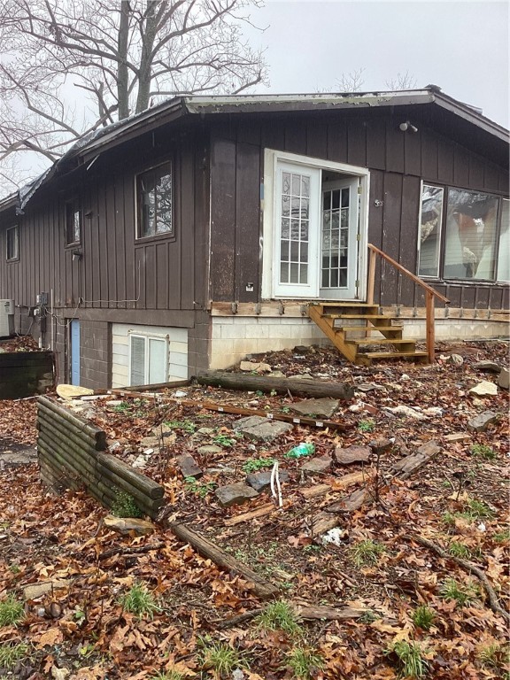 This property is being sold as-is, sight unseen. Entry is not permitted due to unsafe conditions. The home requires a major remodel or may need full demolition, as it is not safe to enter. Located in the Beaver Shores community near Beaver Lake, this property offers potential for future value, but it is in uninhabitable condition and will require significant repairs or complete removal. The sale is strictly as-is, where-is, and the buyer is responsible for verifying all aspects of the property. This is a great opportunity for investors or builders looking for a project. No offer can be accepted until 10 days on market.