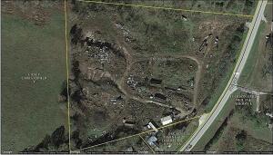 Over 8 acres on HWY 62/412. Could be commercial or residential, it's up to you. As a bonus, there is plenty of scrap metal to sell and offset the cost to purchase. Metal is high so come see this property! Strategically located between Harrison & Mountain Home on Hwy 412.