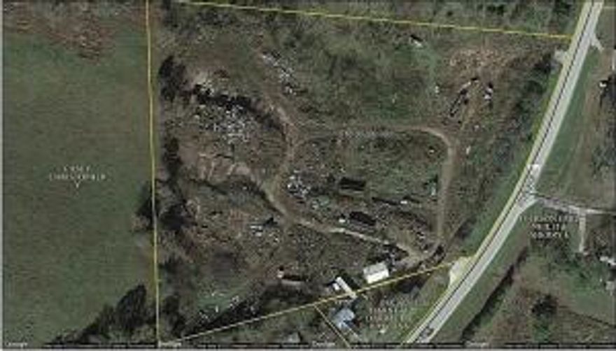 Over 8 acres on HWY 62/412. Could be commercial or residential, it's up to you. As a bonus, there is plenty of scrap metal to sell and offset the cost to purchase. Metal is high so come see this property! Strategically located between Harrison & Mountain Home on Hwy 412.