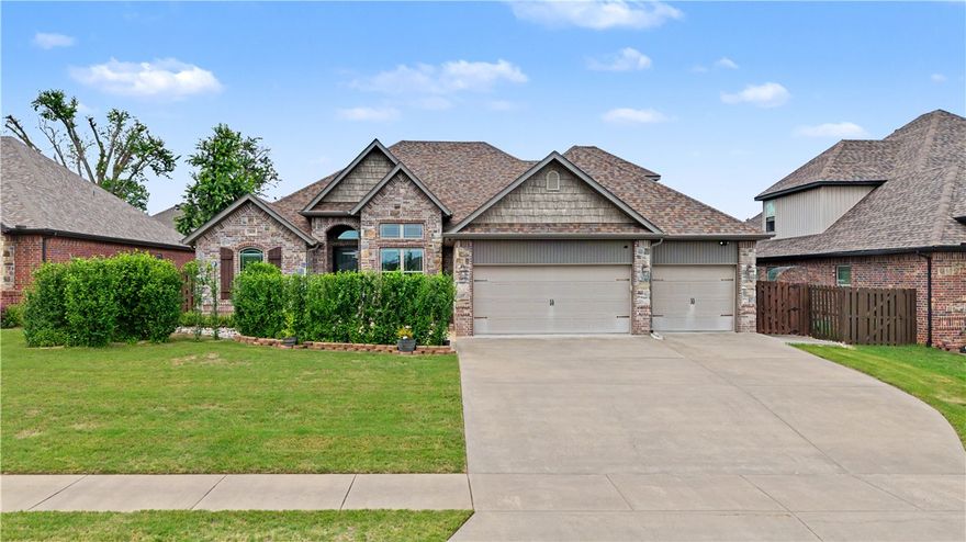 Location, lifestyle, and space—this stunning 5-bedroom home in the highly desirable Grammercy Park subdivision offers it all! Ideally situated just minutes from the Walmart Home Office, Downtown Bentonville Square, Crystal Bridges Museum, and the world-renowned Arkansas Greenway trail system, you'll enjoy convenient access to everything Bentonville has to offer. Inside, the open floor plan is designed for both everyday living and entertaining. The chef's kitchen features granite countertops, a gas cooktop, abundant workspace, and seamless flow into the main living areas. Rich hardwood flooring adds warmth and character throughout. Unwind year-round in the inviting sunroom, complete with its own fireplace—perfect for morning coffee or evening relaxation. With 5 bedrooms, 2 full baths, and 2 half baths, there's room for everyone. Residents also enjoy access to the neighborhood community pool, making this home the perfect blend of comfort, convenience, and community.