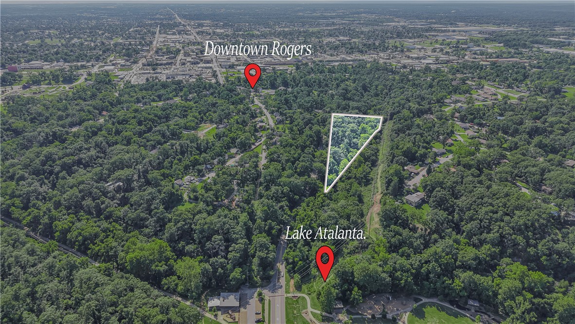A Rare, Buildable Opportunity in the Heart of Rogers!
Nestled just minutes from vibrant downtown Rogers and bordering the natural beauty of Lake Atlanta, this rare parcel offers the perfect canvas for a luxury home, private estate, or visionary eco-development. With direct trail access and walkability to the city center, the location balances tranquility and convenience like no other.
Set across diverse topography, the land features an elevated build site with scenic valley viewsāideal for a stunning custom residence or multiple cabin-style units. A portion of the property includes designated floodplain, presenting a unique opportunity for creative glamping or recreational use.
Whether you're envisioning a sustainable retreat, nature-centered Airbnb project, or a long-term investment in one of Northwest Arkansas' fastest-growing corridors, this property delivers location, potential, and natural beauty in equal measure.
Potential to purchase additional acreage with accepted contract.