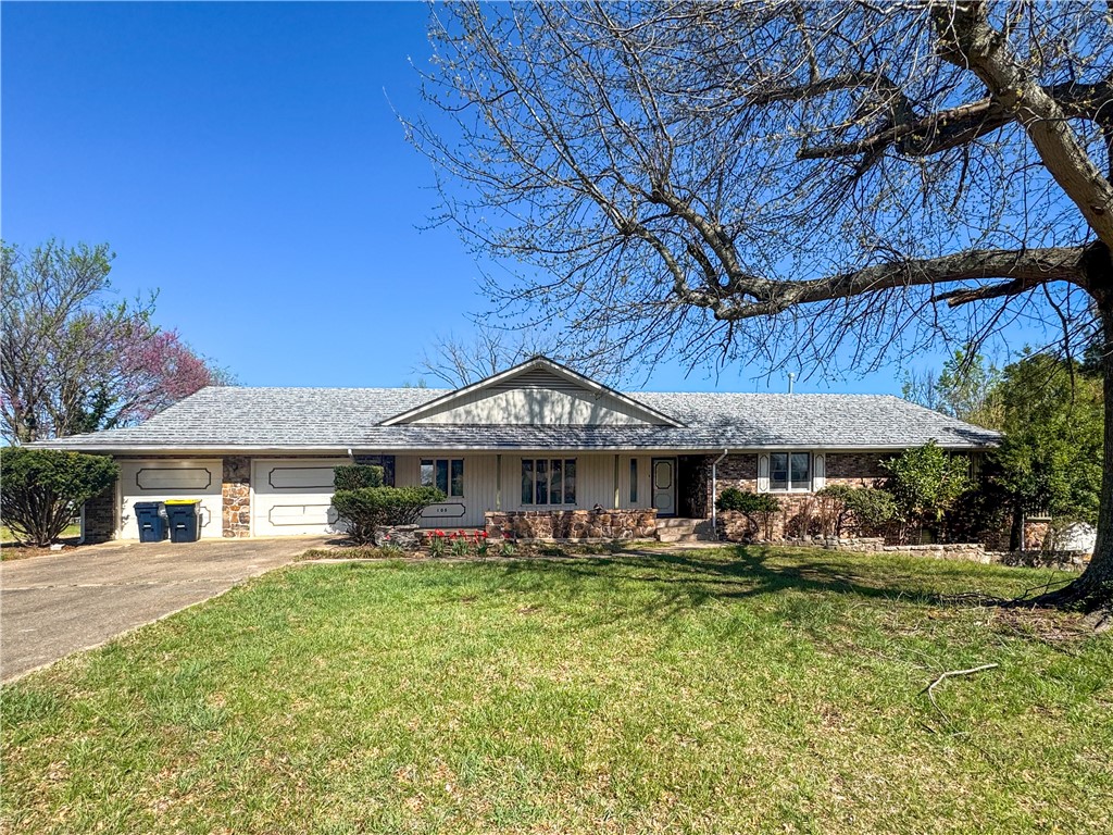 Step back in time in this spacious home in the established Robinwood Subdivisionājust minutes from Creekside Community Center and all that downtown Harrison has to offer. With 3 oversized bedrooms and 2.5 bathrooms on the main level, this home offers plenty of room to spread out. You'll find both a formal living room and a cozy family/dining room with a fireplace, plus a two-car garage for convenience. Downstairs, the partially finished basement includes an additional bedroom and bathroom, a large family room with a second fireplace, and plenty of extra storage space. But the showstopper? Through the sliding glass doors, you'll find an incredible 1,978 sq ft indoor pool area. With rock-lined walls and tons of potential, itās a space you truly have to see to appreciate. While many of the home's finishes are original, it has been well cared for and is ready for new owners to make it their own. Being sold as-is.