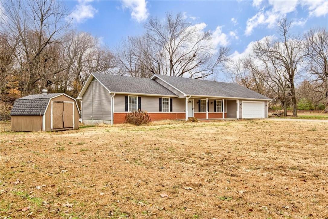 Welcome to this cozy 3-bedroom, 2-bathroom home in Springdale, AR, offering 1,676 square feet of space on a spacious 1-acre lot. Located in the excellent Springdale school district, this residence is perfect for families. The open layout connects the living, dining, and kitchen areas seamlessly, providing a comfortable environment for daily life and entertaining. With a generous backyard and a welcoming atmosphere, this property embodies the charm of Springdale living, promising a comfortable and community-focused lifestyle.