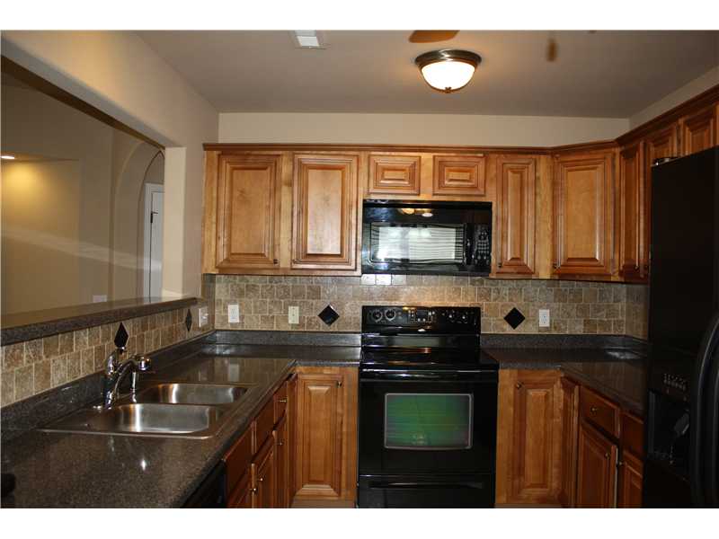 LOVELY HOME WITH 3 BEDROOM 2 BATHS 2 CAR GARAGE. BEHIND OLD WIRE ROAD ELEMENTARY WITH PRIVATE WALKING TRAILS. SPACIOUS OPEN PLAN, GAS LOG FIRE PLACE IN LIVING ROOM EAT IN KITCHEN. HAS INSULATED GARAGE DOOR AND A WHOLE HOME AIR PURIFICATION SYSTEM.