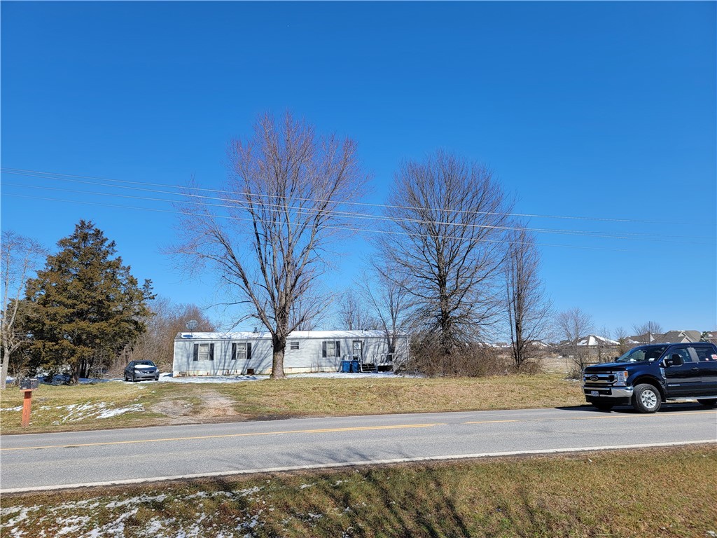 Excellent location!!! 250' of Highway 72 frontage, 1373' deep, Possible commercial and or development property. Property zoned residential, Mobile home and portable building is of no value. Value is in land only.