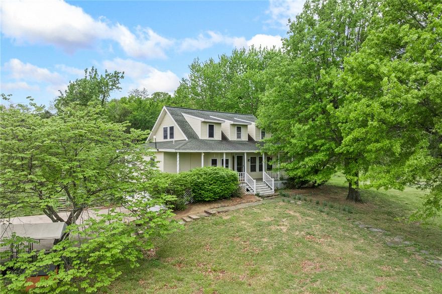 Here is the mini farm you have been looking for with almost 5 acres of beautiful fenced pasture.  Having 4 bedrooms, 3 baths, and a den. Need 5 bedrooms? There is a large bonus room off of the garage that has heating & cooling. Property includes a  30' x 30' shop, greenhouse, and outbuilding. Located in the heart of the Ozark Mountains and near the Buffalo River National Park, this beautiful home is on a paved road, yet with a very private setting in a highly sought out area.  Quality upgrades throughout includes granite countertops, stainless steel appliances, pull out shelves, Lazy Susan and island. Tons of windows throughout the house provide an abundance of natural light. All of this, plus the wrap around deck that you’ve been dreaming of!