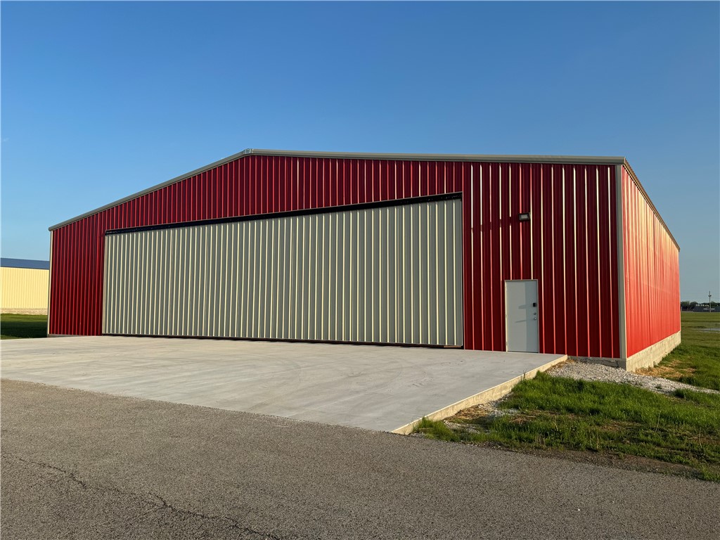 Like new Hangar with 16’x60’ Hydraulic door, fully insulated with normal electrical and LED lighting. There is a chase in concrete floor for future sewer and water connections. Concrete apron connection to taxiway.