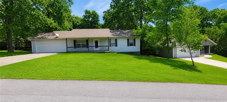Great opportunity to update and make this home your own—whether as a primary residence, second home, or investment property. 3 bedroom and 2 bath single-level home offers just under 1,400 sq. ft. with a flat front yard and gentle backyard slope. The back deck creates a great outdoor space to enjoy. Conveniently located just 1.9 miles from Hwy 71 via Trafalgar for easy access in all directions. Major updates include HVAC replaced 5 years ago and water heater 4 years ago. Septic pumped 5-13-26. Inside, the spacious living room with high ceilings flows nicely into the kitchen and dining area. Enjoy Bella Vista amenities including 7 golf courses, 7 lakes, tennis, pickle ball, clubhouses, hiking and mountain biking trails, plus the future chair lift at OZ Trails Bike Park less than 4 miles away. Conveniently located near back 40.