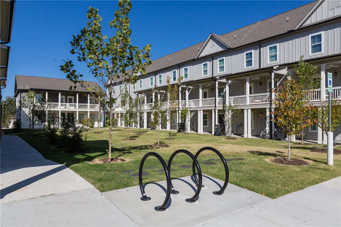 Available 8/1/25. Mitchell Yards, a cottage and townhome community, is located near the heart of University of Arkansas' campus. Located one mile from Donald W. Reynolds Razorback Stadium and the heart of campus , Mitchell Yards is the perfect location to call home! Our expansive courtyards, private balconies, garages, spacious floor plans and open concept designs are designed with YOU in mind!
Online 3d tour only.