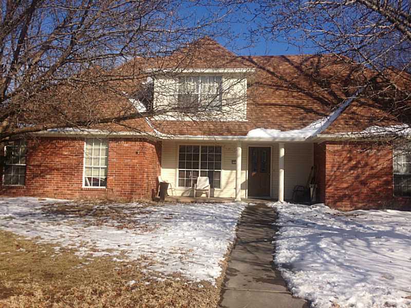 Sitting on almost half an acre, four bedroom home, beautiful brick fireplace on a corner lot with landscaped yard and privacy fence.