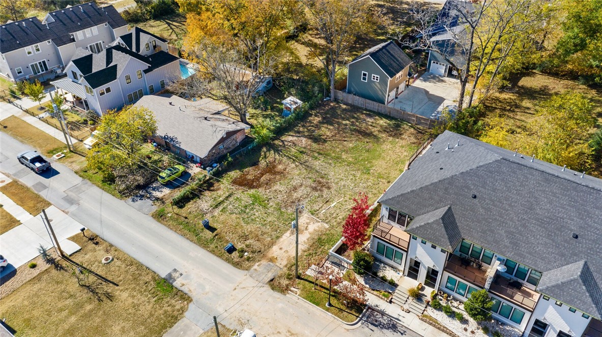 Prime Downtown Bentonville Arts District location! Land is zoned DN-3 (Downtown High Density Residential up to 3 units). Cleared Level Land - Ready to Build. Be Near City Hall and The Ledger, along with easy Walk to all your favorites: Skylight Cinema, Junto, Ladyslipper, Callisto, The Hub Bike Lounge, Stoic Brewing, Peddlers Pub, Crepes Paulette...the list just keeps growing and getting better! Crosstown Trail takes you to our incredible downtown library and straight over to The Momentary, as well as connecting you to Arkansas Razorback north south trail!