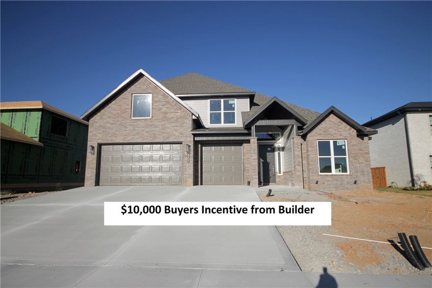 $10K Buyers Incentive from Builder. Use how you want for closing cost, pre-paids, interest rate buy down or approved upgrades. Unbelievable floor plan with two story living room. Exceptional built 3 car garage, brick & stone home with
hardwood floors, huge kitchen, central vac, home audio, security system and more. Kitchen has large island with veggie sink, double ovens, walk in pantry, tons of cabinets and storage. Two
story living room with corner fireplace & windows open to covered patio. Large mud room with cubbies
and a spacious laundry room with sink and counter space. Large luxurious master bedroom with double sinks, soaking tub, walk in tile shower, and massive walk in closet. Secondary bedroom on the main level that would be a perfect study.  Large bonus room on the second level with built in wet bar, perfect for entertaining. Conveniently located within walking distance of the Bentonville Schools.