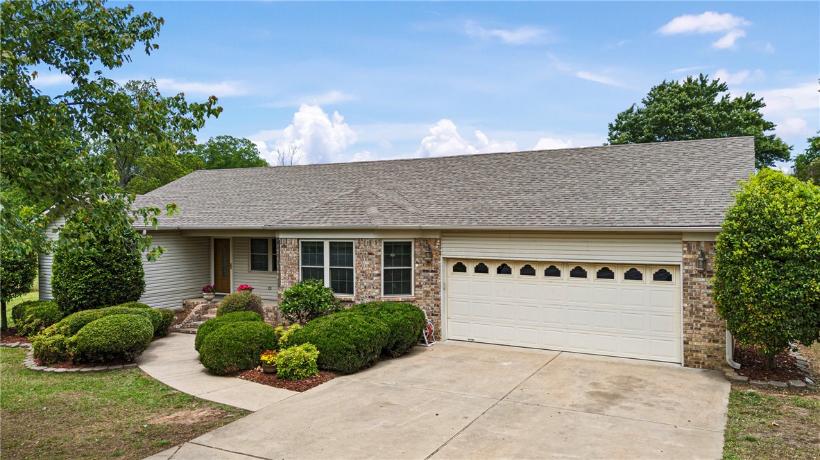 Located in the highly sought-after Pottsville School District, this spacious 3-bedroom, 2-bath home offers the perfect blend of convenience and comfort. Just 10 minutes from Russellville on SR 247, you'll love the easy access to town while enjoying the peace of 1.6 acres. The beautifully updated kitchen features granite countertops and a functional layout perfect for daily living and entertaining. Step outside to a large covered deck with a full outdoor kitchen—ideal for hosting friends and family. The huge fenced backyard offers plenty of space for kids, pets, or gardening. Bonus: a mobile home on-site can convey!