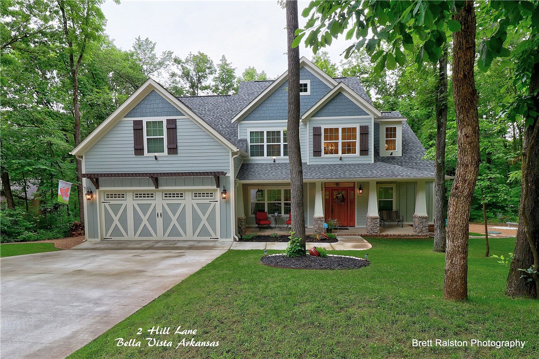 Chip & JoAnna would be envious! Custom Home is absolutely stunning. Grand entry! Barn doors. Beautiful ceiling treatments in formal DR. Wood Beams, hand scraped floors, wood burning FP! Beautiful kitchen w/island, granite, farm sink. Gas cook top w/pot filler. Master has coffered ceiling and shiplap. Soaking tub, walk through shower. His/Hers vanities and closets.Utility rm has pup bathing station. Beautiful covered patio w/gas log FP. Private path to the bike trail & Blowing Springs Park.