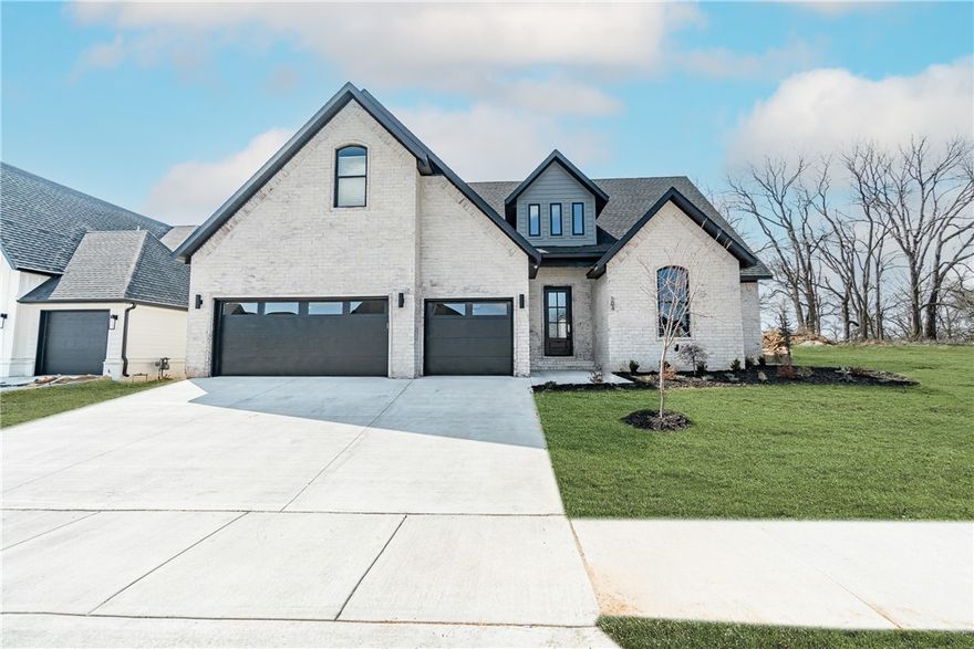 Stunning new construction home in the coveted Autumn Hills subdivision! This immaculate two story home features a phenomenal open floor plan ideal for entertaining guests. The kitchen is a chef’s dream with its floor to ceiling cabinets, 48 inch professional range, large island with an abundance of counter space, and spacious walk-in pantry. The exquisite master suite features an ensuite bathroom and spacious walk-in closet with laundry room access. Enjoy evenings from your spacious covered back patio. Additional amenities include sound wiring throughout, a media room that could be a 5th bedroom, and built-in shelving and cabinetry in the living area. Located just minutes from Downtown Bentonville, local schools, and miles of walking and biking trails at Coler Creek, this home has access to everything you need. Welcome home!