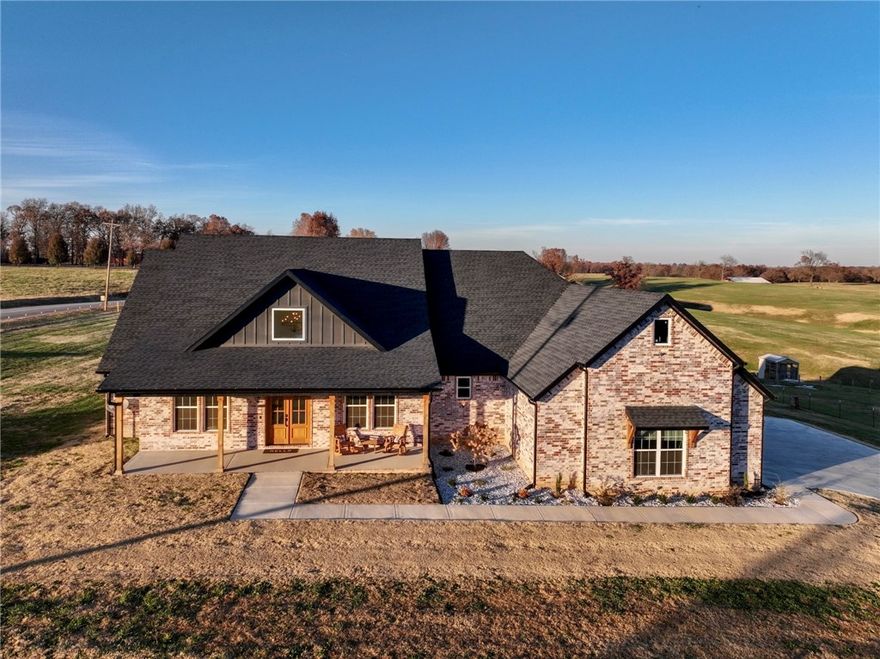 Welcome to your dream home sitting on 2 acres, 4 bed, 3 full and 1 half bath plus an office. Centrally
located in Tontitown we find this Luxury Modern Farmhouse. The entry features vaulted ceilings plenty of natural light a large open concept kitchen and spacious living room. The kitchen features custom quartz countertops and backsplash along with Professional SS Appliances and a dream walk-in pantry with plenty of storage. A smart home with 3 keyless entry deadbolts, Nest Doorbell/Nest Thermostat and one wired Nest Camera included. This home was also built with furbabies in mind by having the whole property fenced in, a doggy door that leads out to the back porch and a custom designed dog shower. The oversized 3 car garage is 988 square feet and also has smart garage doors. Ready to house it's next family with plenty of room to grow this property has the space for anything from gardening a large shop or a pool the possibilities are endless. Lender credit up to $3K available and Builder Credit of $10K available.