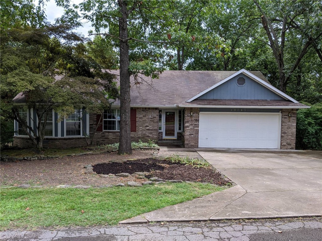 Awesome setting near Beaver Lake!!! Gorgeous home in the Dream Valley Subdivision. Features include 3 bedrooms, 2 1/2 baths. Downstairs bonus/office/game room with 1/2 bath. Could serve as 4th bedroom. Huge master suite with his/hers walk in closets. Laminate plank flooring throughout. Storage shed, huge deck overlooking wooded area. Fire pit to relax in the cool evenings. Minutes from Prairie Creek Marina.