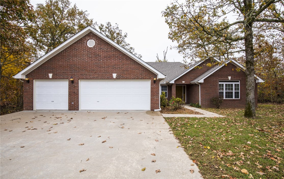 Highly desired subdivision in Loch Lomand lake area. This one owner one level home on Stonehaven Dr has two lots with .95 acres. Home features large kitchen with island and tons of custom cabinets, large pantry, laundry room with pantry, sink, and cabinets, real hardwood flooring in dining area and 4th bedroom/office, 2 full bathroom and guest half bath, large windows for lots of light, large deck overlooking private yard with wooded views, vaulted and trey ceilings, 3 car garage with insulated doors, New roof in 2019, and a new 50 gallon hot water heater.