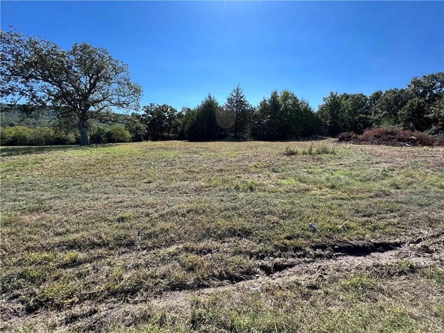 Gorgeous custom home lot featuring an on-site pond—truly a rare find with city sewer and water already available.